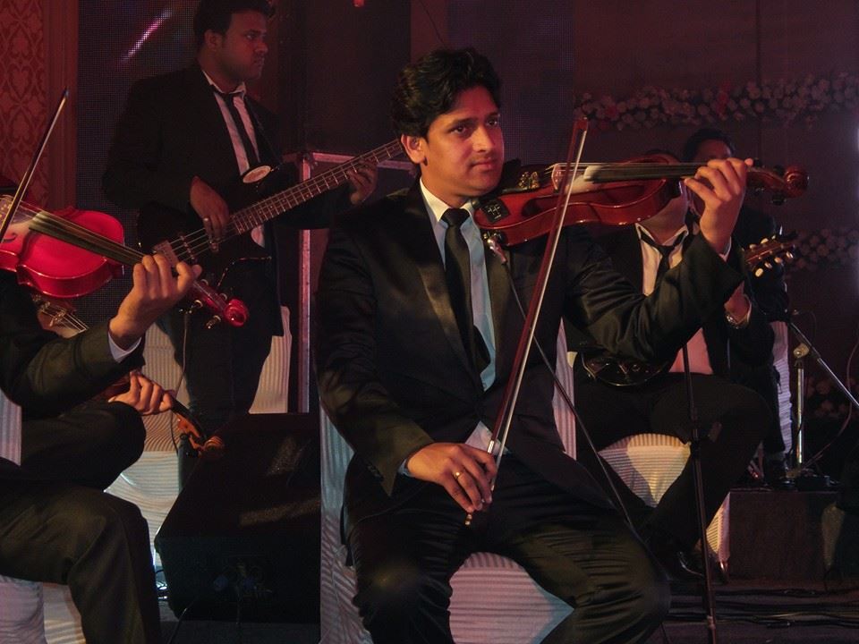 male violin players muharraq bahrain